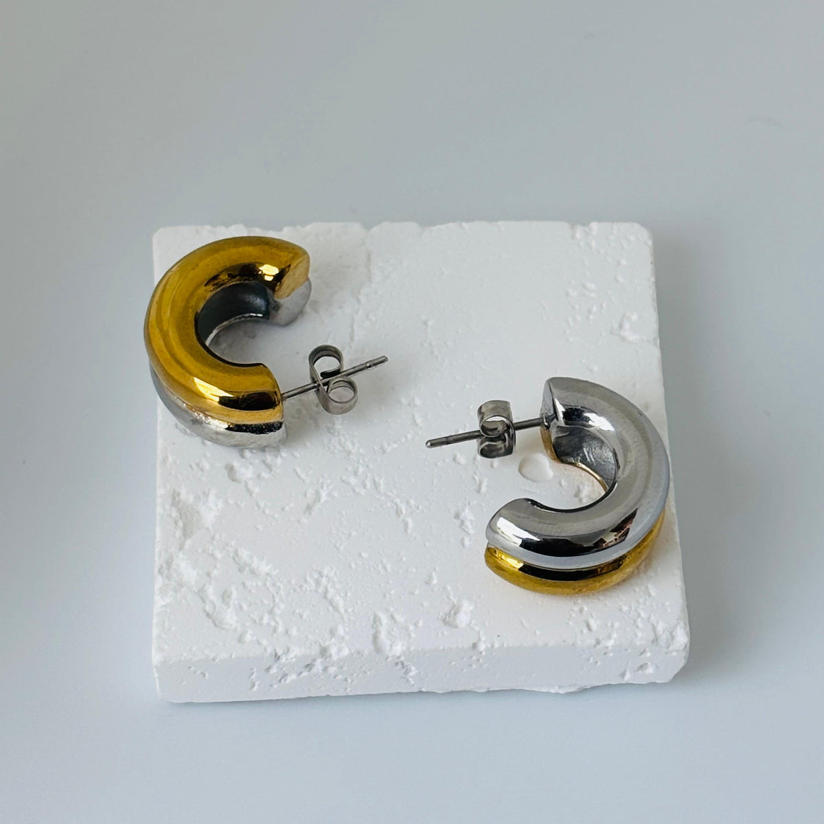 Luxe Fusion Hoops, gold and silver PVD earrings by Febae – view 4
